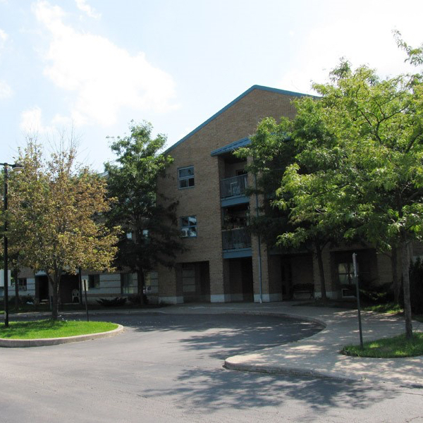 Exterior of Watermark Building.  There are a few trees in view